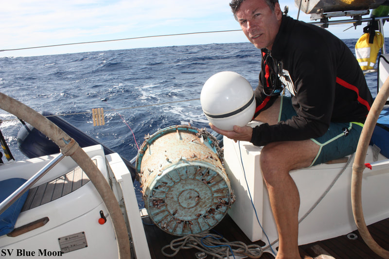 Captain Russ Johnson attaching a satellite tracker and bio research tile to Industrial bucket found in the Great Pacific Garbage Patch

SV Blue Moon